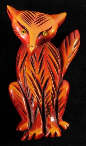 BAKELITE OVER DYED FOX WITH MOVEABLE HEAD PIN.    