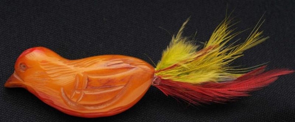 BAKELITE BIRD WITH FEATHER TAIL PIN.              