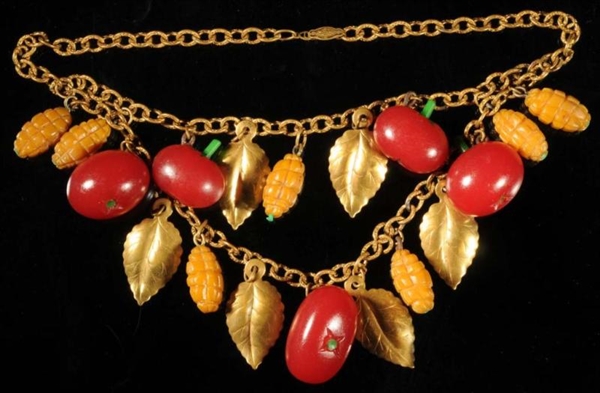 BAKELITE TOMATO & CORN NECKLACE WITH METAL LEAVES.
