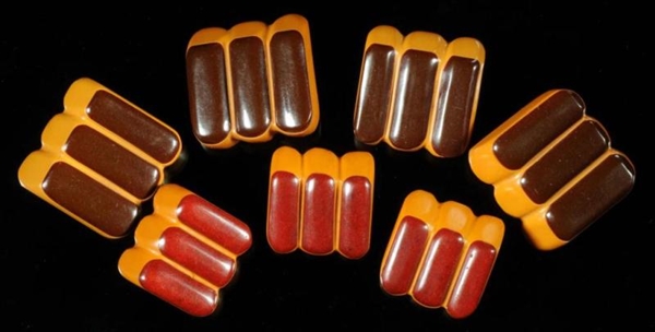 LOT OF 7: LAMINATED BAKELITE 2-COLOR BUTTONS.     