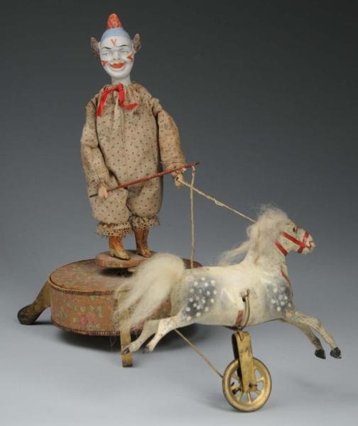 TRICK PONY AND CLOWN TRAINER MECHANICAL TOY.      