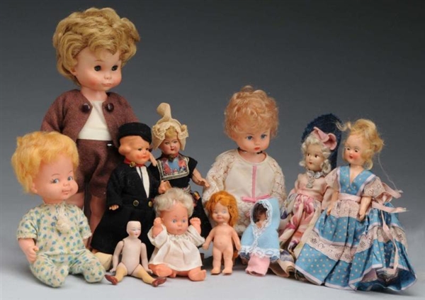 LOT OF 11: ASSORTED DOLLS.                        