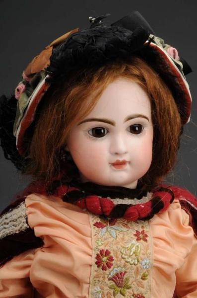 LARGE FRENCH BISQUE HEAD DOLL.                    