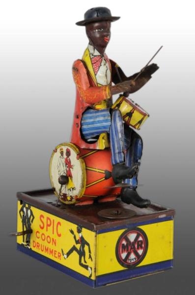 TIN MARX SPIC THE COON DRUMMER WIND-UP TOY.       