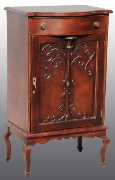 MAHOGANY SHEET MUSIC CARVED DISC CABINET.         