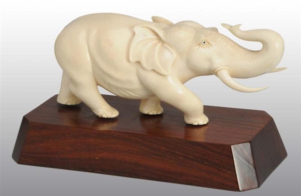 SOLID IVORY ELEPHANT STATUE.                      