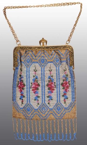 BEADED VICTORIAN LADYS PURSE WITH FLORAL DESIGN. 