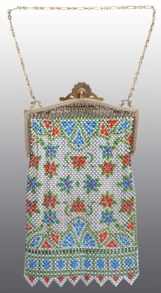 MESH VICTORIAN LADYS PURSE WITH FLORAL DESIGN.   