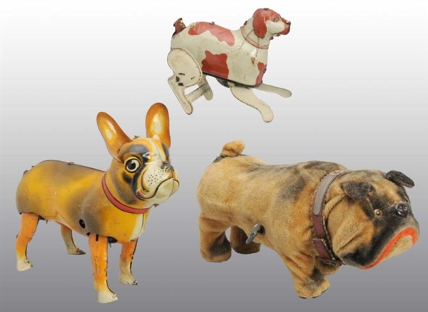 LOT OF 3: DOG WIND-UP TOYS.                       