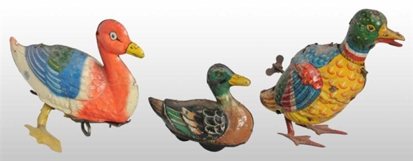 LOT OF 3: TIN LITHO DUCK WIND-UP & FRICTION TOYS. 