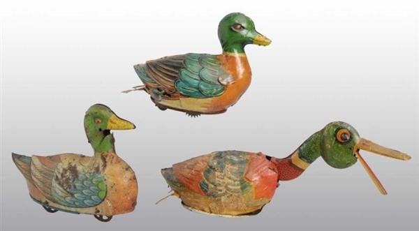 LOT OF 3: TIN DUCK WIND-UP TOYS.                  