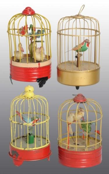LOT OF 4: BIRD IN CAGE WIND-UP TOYS.              