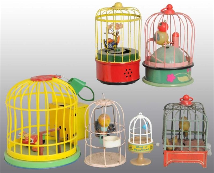 LOT OF 6: BIRD IN CAGE WIND-UP TOYS.              