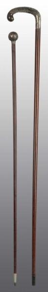 LOT OF 2: STERLING HANDLED CANES.                 