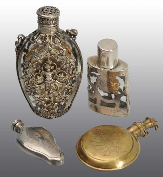 LOT OF 4: SMALL PERFUME BOTTLES.                  