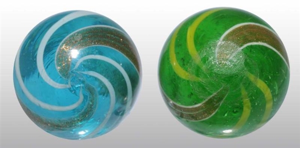 LOT OF 2: COLORED GLASS LUTZ MARBLES.             