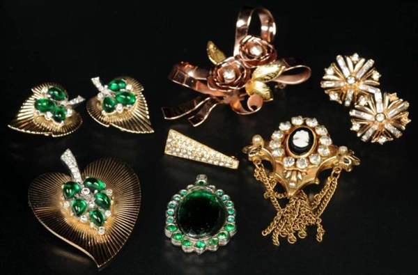 LOT OF 9: ANTIQUE COSTUME JEWELRY PIECES.         