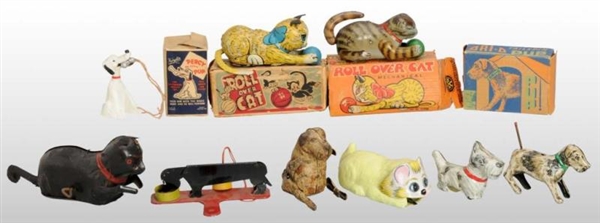 LOT OF 9: CAT & DOG FRICTION & WIND-UP TOYS.      