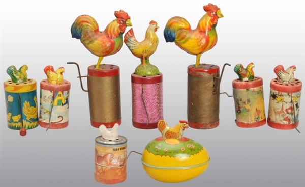 LOT OF 9: CARDBOARD & TIN ROOSTER CRANK-TYPE TOYS.