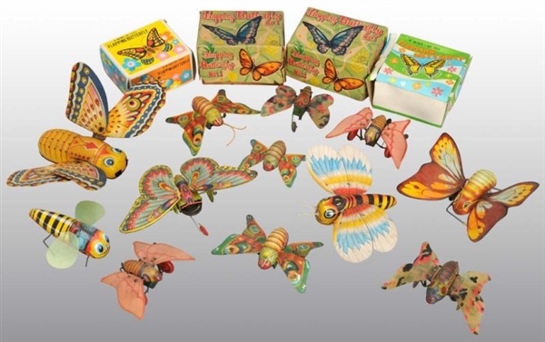 LOT OF 12: TIN BUTTERFLY TOYS.                    