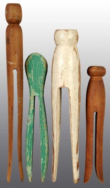 LOT OF 4: LARGE CLOTHESPINS.                      