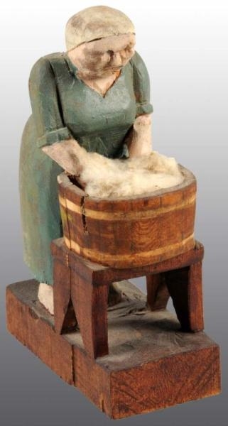 WOODEN HAND CARVED FOLK ART WASHER WOMAN.         