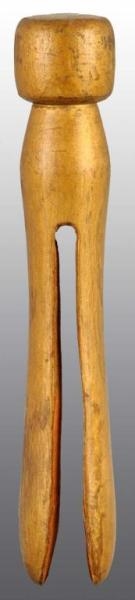 EARLY WOODEN CLOTHESPIN.                          
