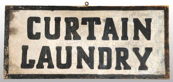 EARLY WOODEN CURTAIN LAUNDRY SIGN.                