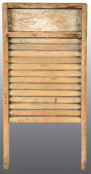 EARLY WOODEN WASHBOARD.                           
