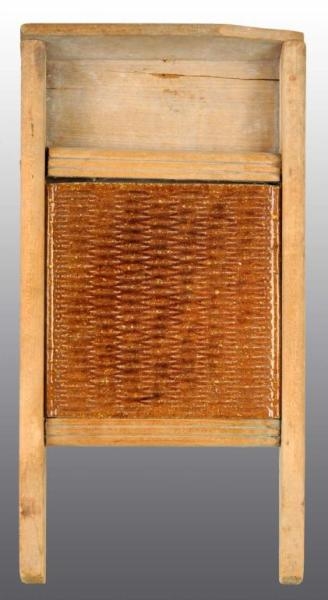 SMALL WOODEN WASHBOARD WITH POTTERY RIBS.         