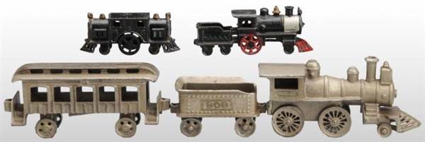 LOT OF CAST IRON TOY TRAINS.                      