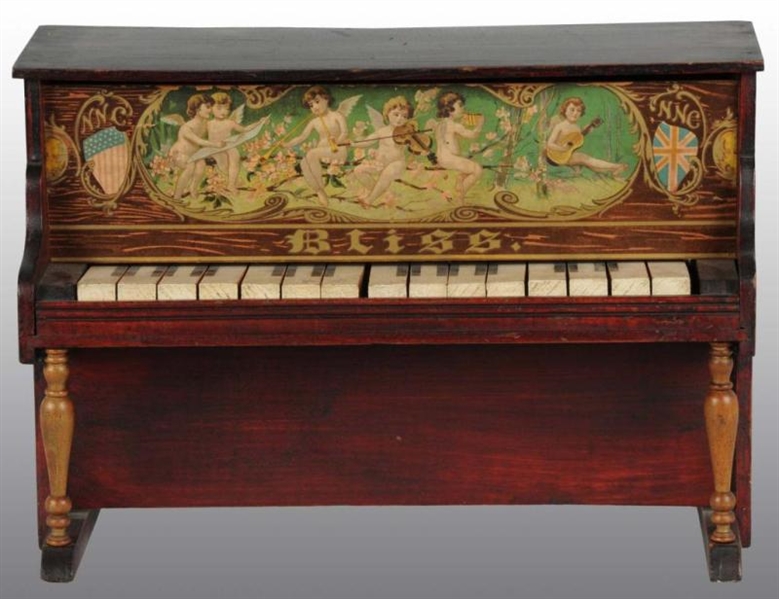 WOODEN BLISS PIANO TOY.                           