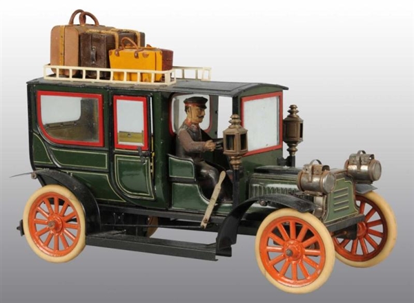 TIN HAND-PAINTED CARETTE LIMOUSINE WIND-UP TOY.   
