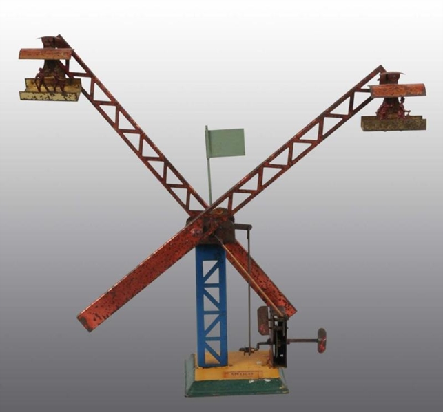 TIN AMUSEMENT PARK-TYPE WIND-UP TOY.              