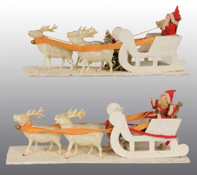 LOT OF 2: SANTA IN SLEIGH WITH CELLULOID DEER.    