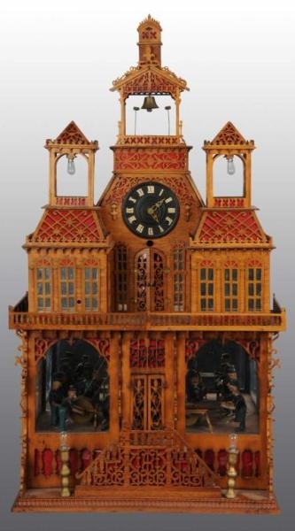 FRETWORK HOUSE CLOCK WITH MOVING PEOPLE.          
