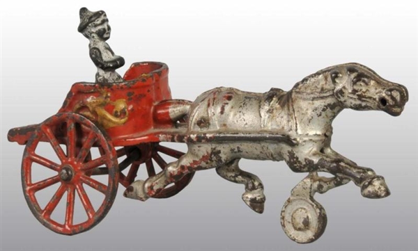 CAST IRON KENTON CHARIOT TOY WITH CLOWN FIGURE.   