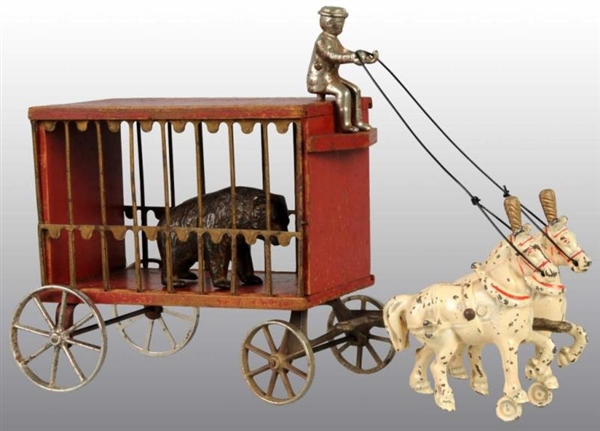 CAST IRON & WOOD ARCADE CIRCUS CAGE WAGON TOY.    