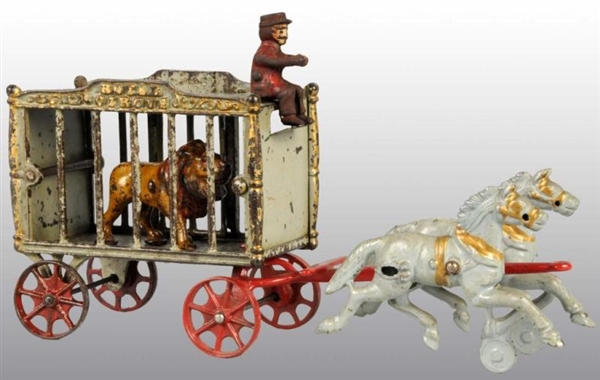 CAST IRON 2-HORSE ROYAL CIRCUS CAGE WAGON TOY.    