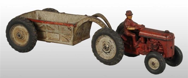 CAST IRON ARCADE TRACTOR TOY WITH WAGON.          