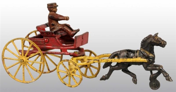 CAST IRON HUBLEY FIRE CHIEF WAGON TOY.            