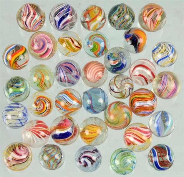 LOT OF 35: HAND-MADE MARBLES.                     