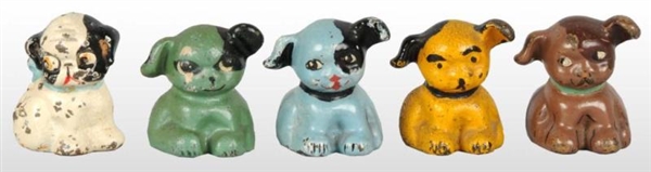 LOT OF 5: CAST IRON PUPPO PAPERWEIGHTS.           