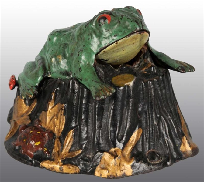 CAST IRON TOAD ON STUMP MECHANICAL BANK.          