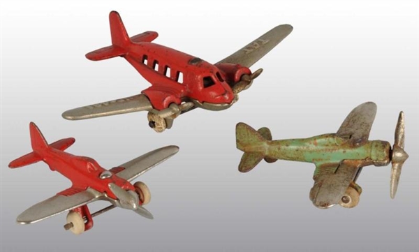 LOT OF 3: CAST IRON HUBLEY AIRPLANE TOYS.         
