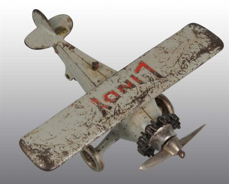 CAST IRON LINDY AIRPLANE TOY.                     