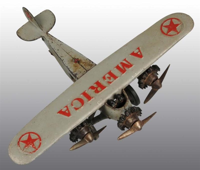 CAST IRON HUBLEY AMERICA AIRPLANE TOY.            