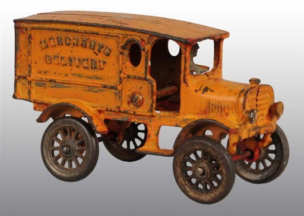 CAST IRON MERCHANTS DELIVERY TRUCK TOY.           
