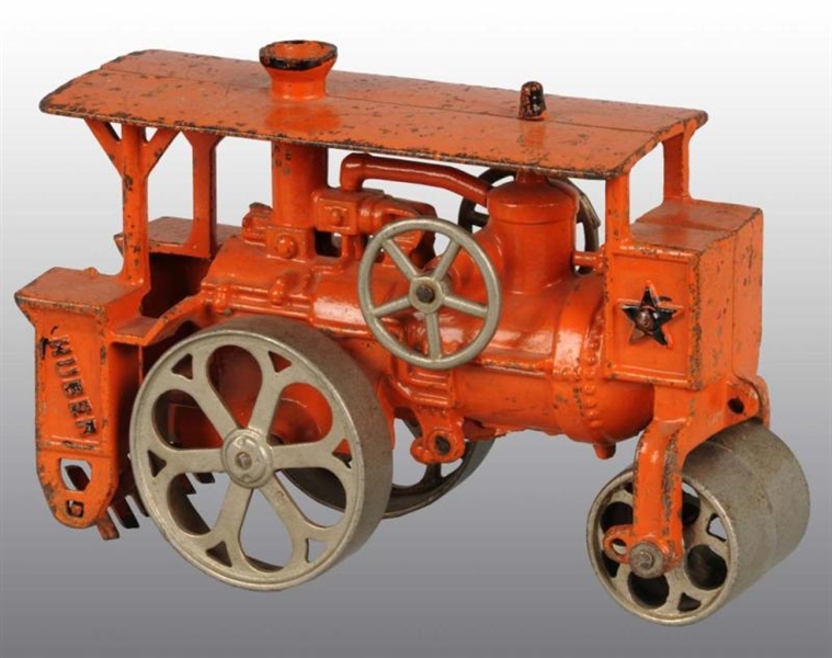 CAST IRON HUBLEY HUBER ROLLER TOY.                
