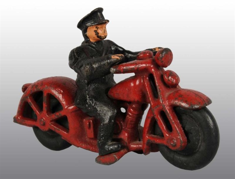 CAST IRON HUBLEY MOTORCYCLE TOY.                  